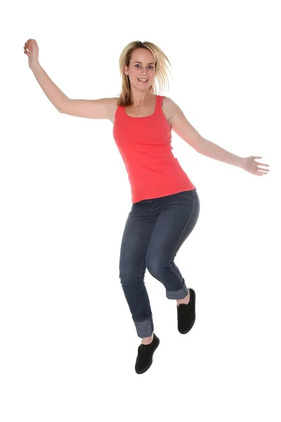 Menina loira bonita pulando para a alegria — Fotografia de Stock