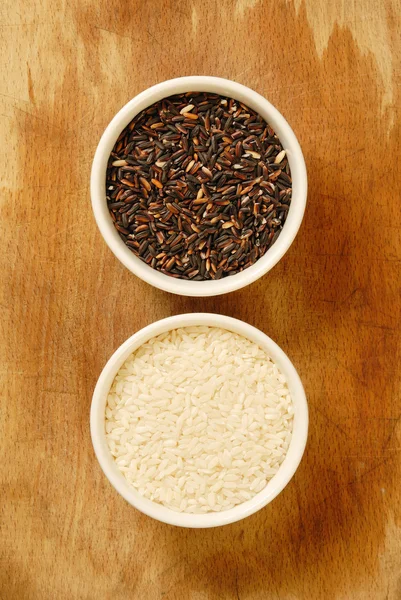 stock image White rice and black rice