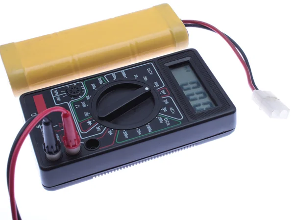 stock image Use the multimeter to meterage a Battery.