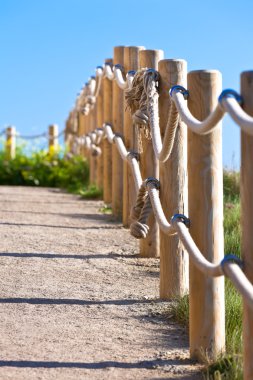 Pathway with wood post fence clipart