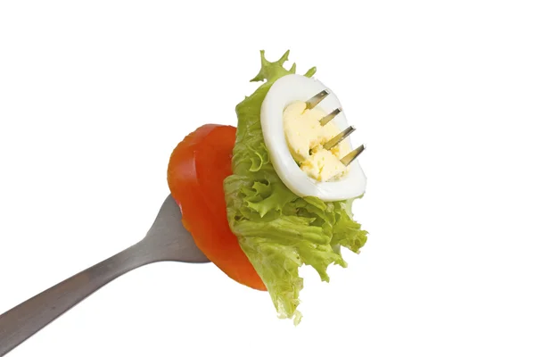 Вкусный салат на вилке — стоковое фото