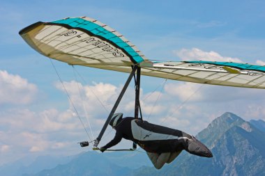 Hanggliding in swiss alps clipart