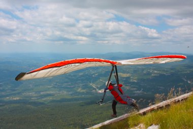 Hang gliding in Croatia clipart