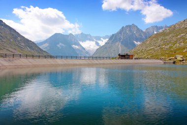 Mountains and lake in Switzerland clipart