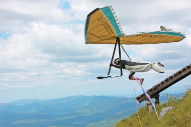 Hang gliding in Croatia clipart