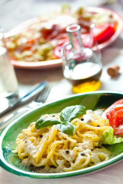 Fresh pasta with pepper sauce — Stock Photo, Image