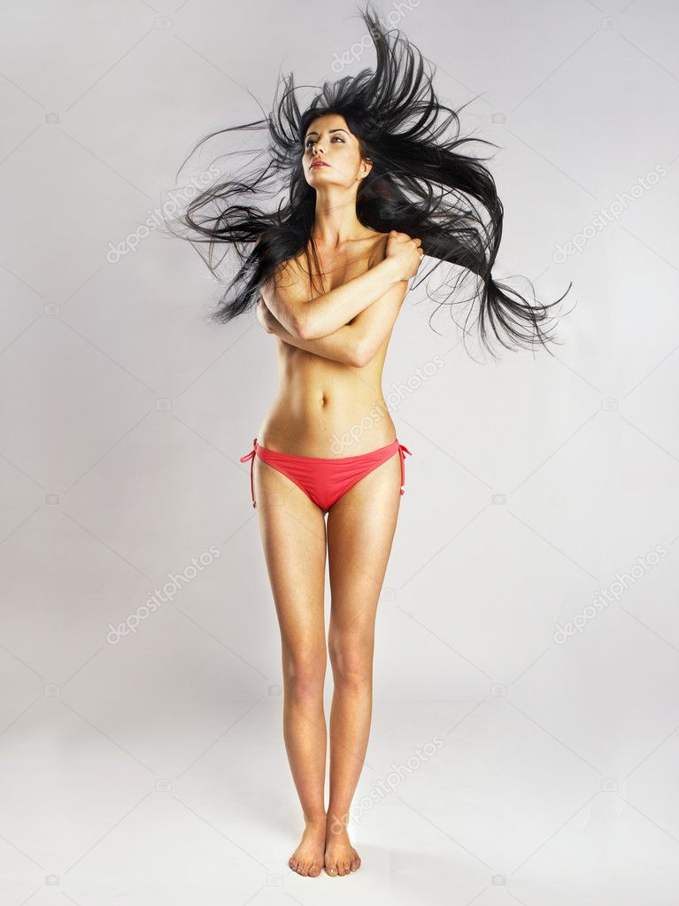 Beautiful nude woman with magnificent hair
