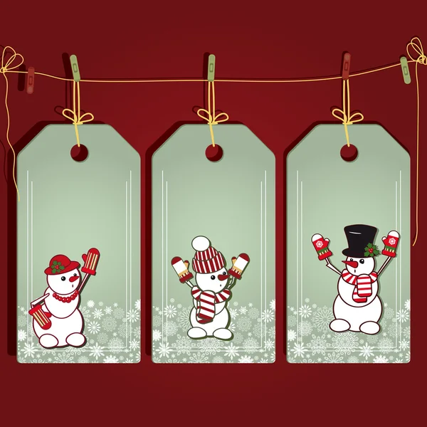 Etiquetas de presente de Natal com elementos da decoração de Natal . —  Vetores de Stock