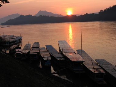 Boats at sunset clipart