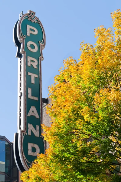 Portland Oregon neon sign with fall trees — Stock Photo, Image