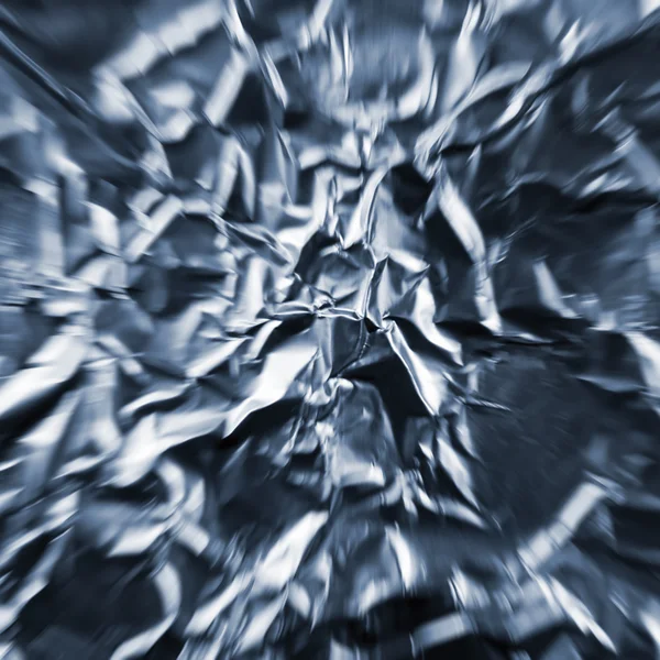 Abstrakt zoom tunnel av skrynkliga silver aluminiumfolie närbild ba — Stockfoto