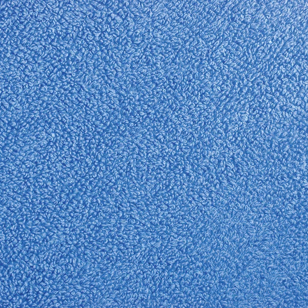Blue plush terry cloth turkish bath towel macro background close — Stock Photo, Image