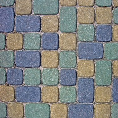 Cobblestone Texture Background Closeup in colorful green, yellow clipart