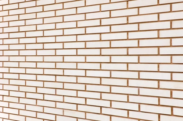 Beige fijne bakstenen muur textuur achtergrond perspectief, la — Stockfoto