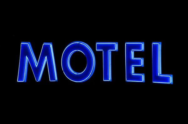 Neon niebieski znak motel w nocy — Zdjęcie stockowe