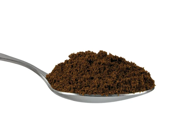 Spoonful of fine ground medium roasted Arabica coffee for espresso — Stock Photo, Image