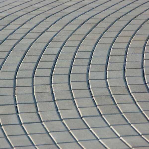 Kullersten trottoar textur, isolerade radiellt mönster — Stockfoto