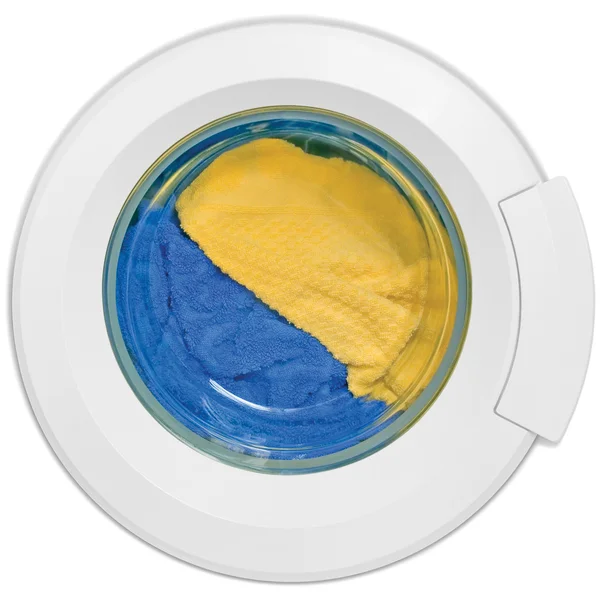Porta da máquina de lavar roupa, roupas coloridas limpas, amarelo, azul plush — Fotografia de Stock