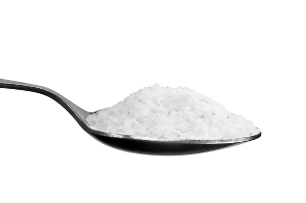 Zbliżenie grubej soli, na białym tle makro łyżeczka łyżka — Zdjęcie stockowe