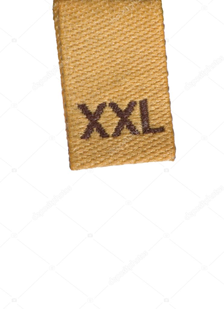 Macro of XXL size clothing label on white