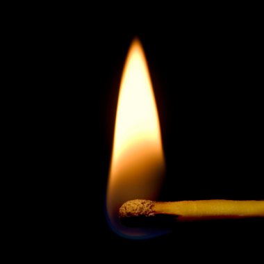 Burning Match Closeup Isolated On Black clipart