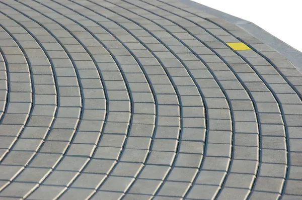 stock image Cobblestone Pavement Texture With Yellow Brick