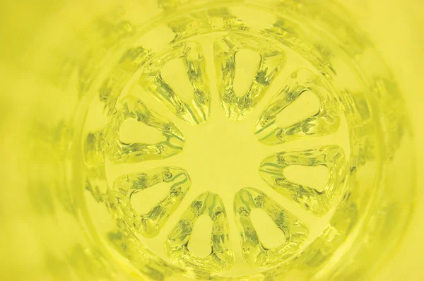 Perspektywy kalejdoskopie szkło żółte tło — Zdjęcie stockowe