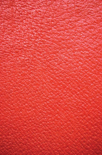 Fondo de cuero de grano rojo, textura natural, primer plano vertical de macro — Foto de Stock