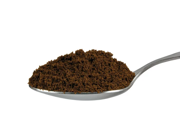 Spoonful of fine ground medium roasted Arabica coffee for espresso — Stock Photo, Image