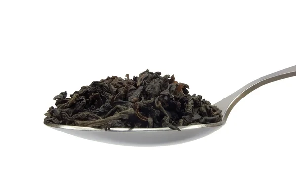 Łyżkę liści herbaty luzem czarny — Zdjęcie stockowe
