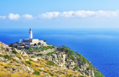 Lighthouse on cape formentor clipart