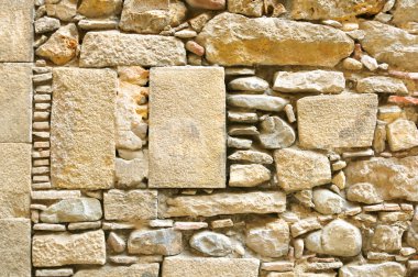 Fragment of ancient wall made of stones clipart