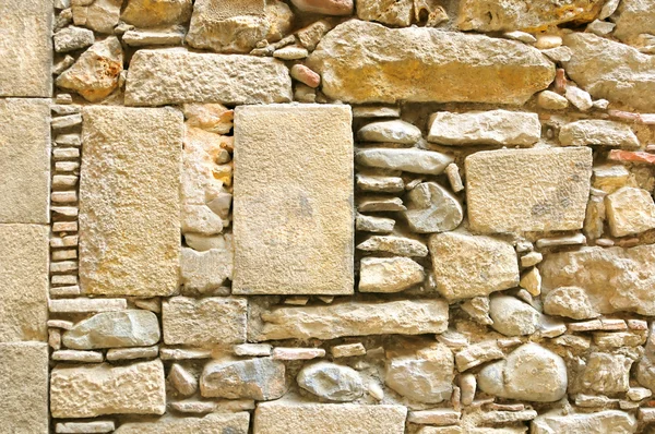 Fragment of ancient wall made of stones