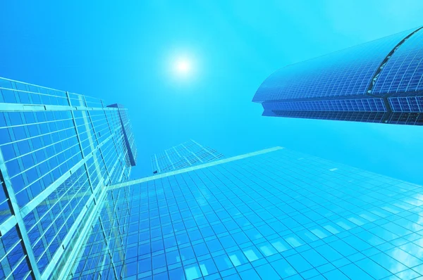 Modern business centre skyscrapers blue-toned — Stock Photo, Image