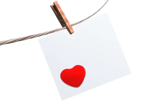 Corazón y tarjeta en blanco aislados sobre fondo blanco — Foto de Stock