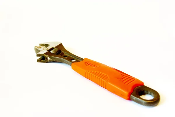 Κλειδί με ένα πορτοκαλί λαβή — Stockfoto