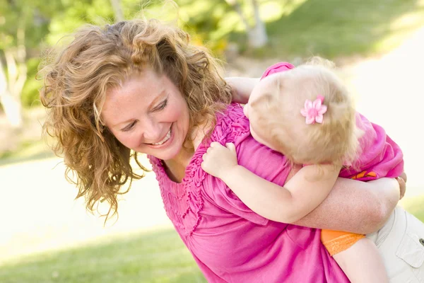 Mother and Daughter Piggyback in the Park — Stock Photo, Image