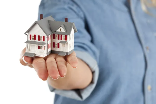 House in Female Hand on White — Stock Photo, Image