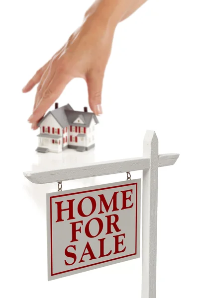 Womans Hand Choosing Home with Real Estate Sign in Front — Stock Photo, Image