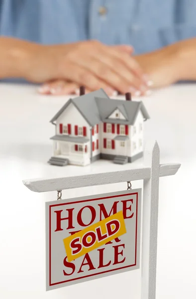 Womans Hands Behind House and Sold Real Estate Sign — Stock Photo, Image