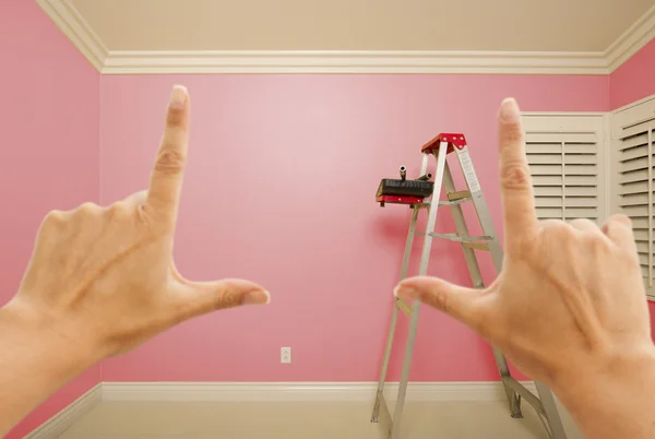 Hands Framing Pink Painted Wall Interior — Stock Photo, Image
