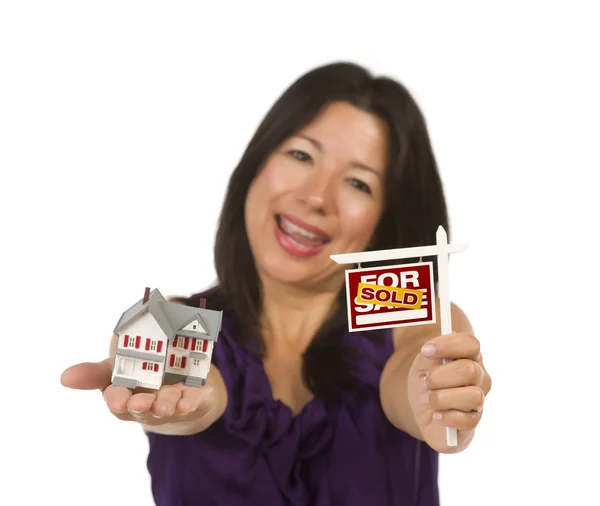 Multiethnic Woman Holding Small Sold For Sale Real Estate Sign a — Stock Photo, Image