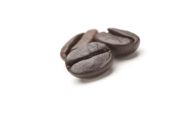 Three Roasted Coffee Beans on White — Stock Photo, Image