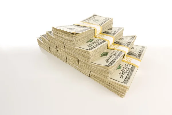 Montones de billetes de cien dólares en la gradación — Foto de Stock