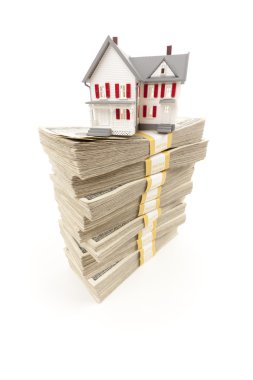 Small House on Stacks of Hundred Dollar Bills clipart