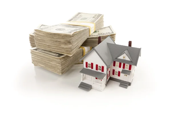 Small House with Stacks of Hundred Dollar Bills — Stock Photo, Image