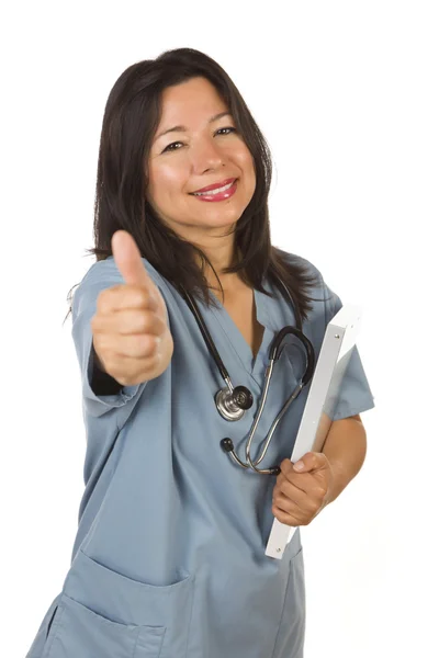 Médico hispânico atraente ou enfermeira com polegares para cima — Fotografia de Stock