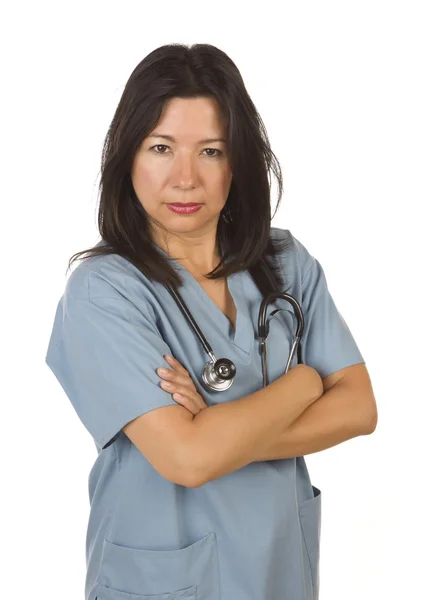 Médecin hispanique sérieux ou infirmière sur blanc — Photo