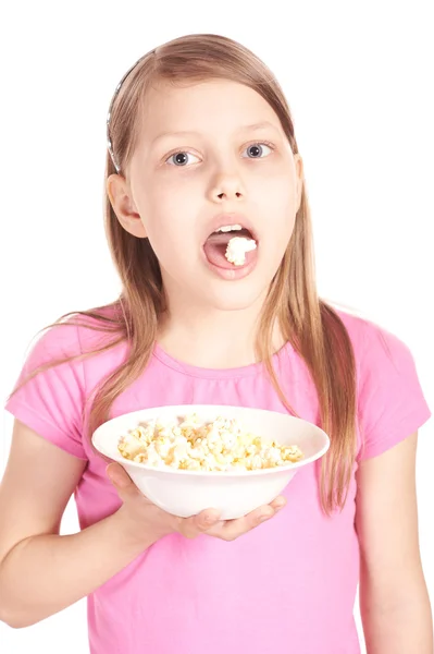 stock image Portrait of a little girl with popcorn on white