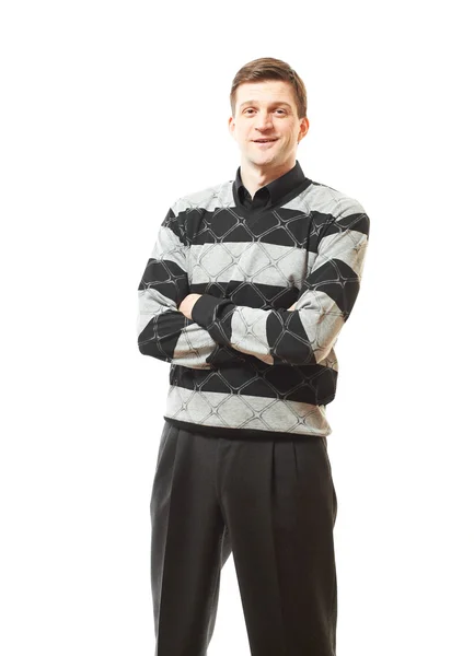 Atraktivní mladý muž v svetru na bílém pozadí — Stock fotografie